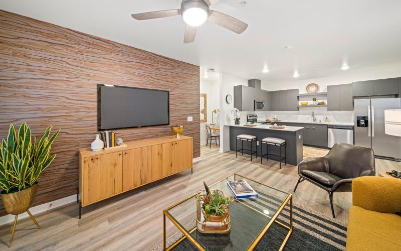 a living room with a tv and a table