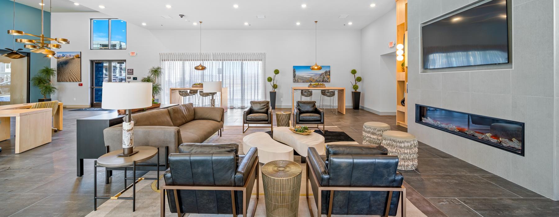 a living room with a chandelier and a couch