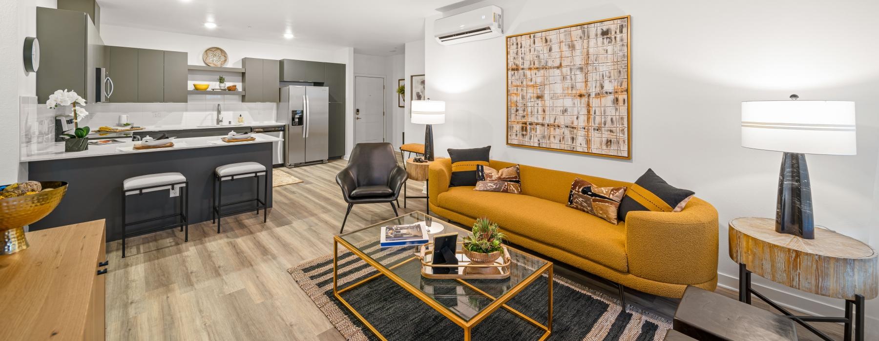 a living room with a large ceiling fan